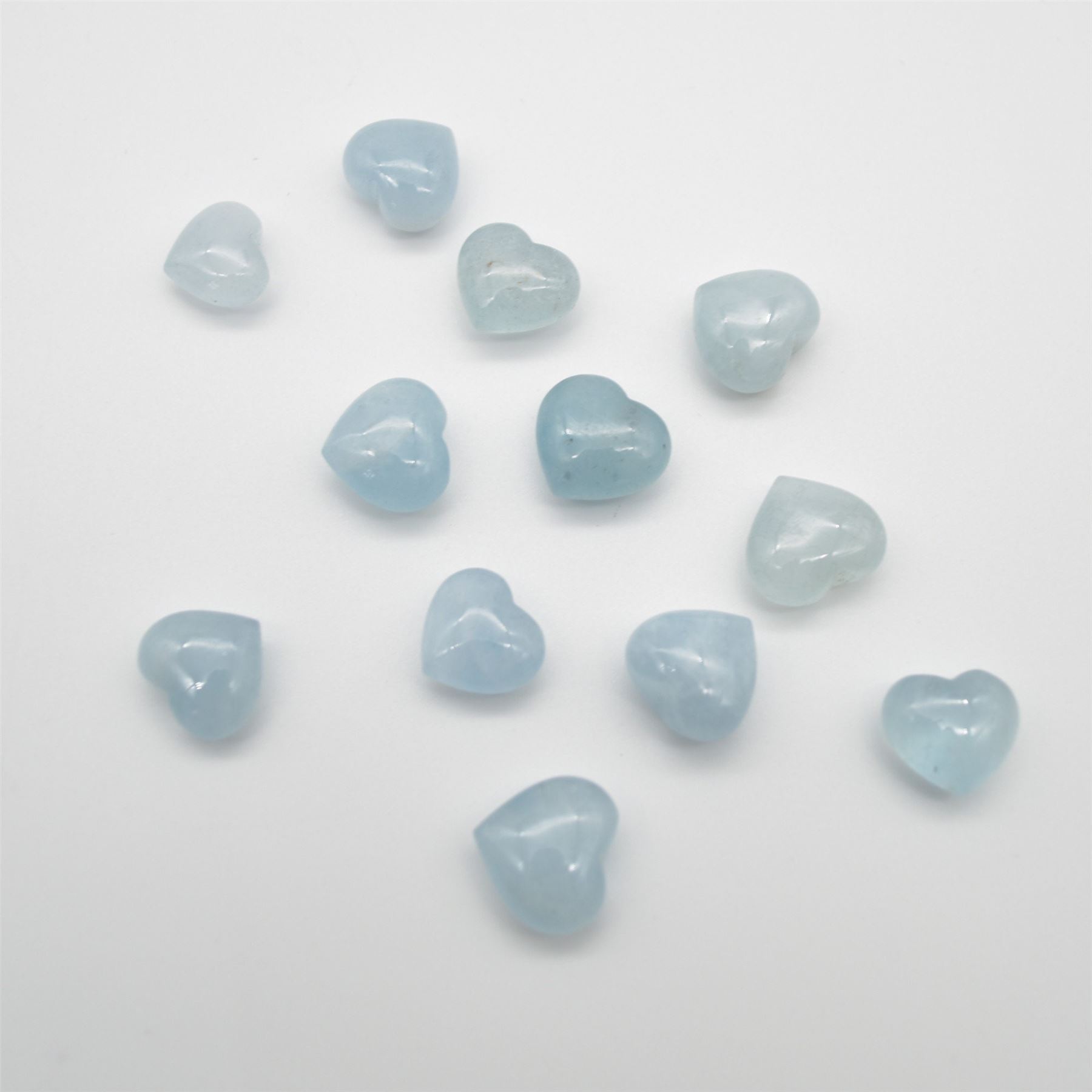 4 Aquamarine Mini Hearts - 1cm - 1.2cm